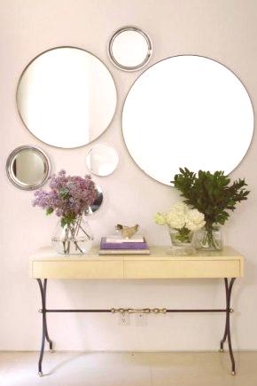 Зидно огледало (61 фотографија): округла и овална огледала на зиду, необични велики модели и дизајнерски декоративни предмети у ентеријеру